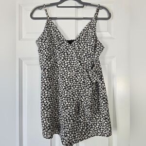 She Sky Black/white floral print romper. Size Medium.